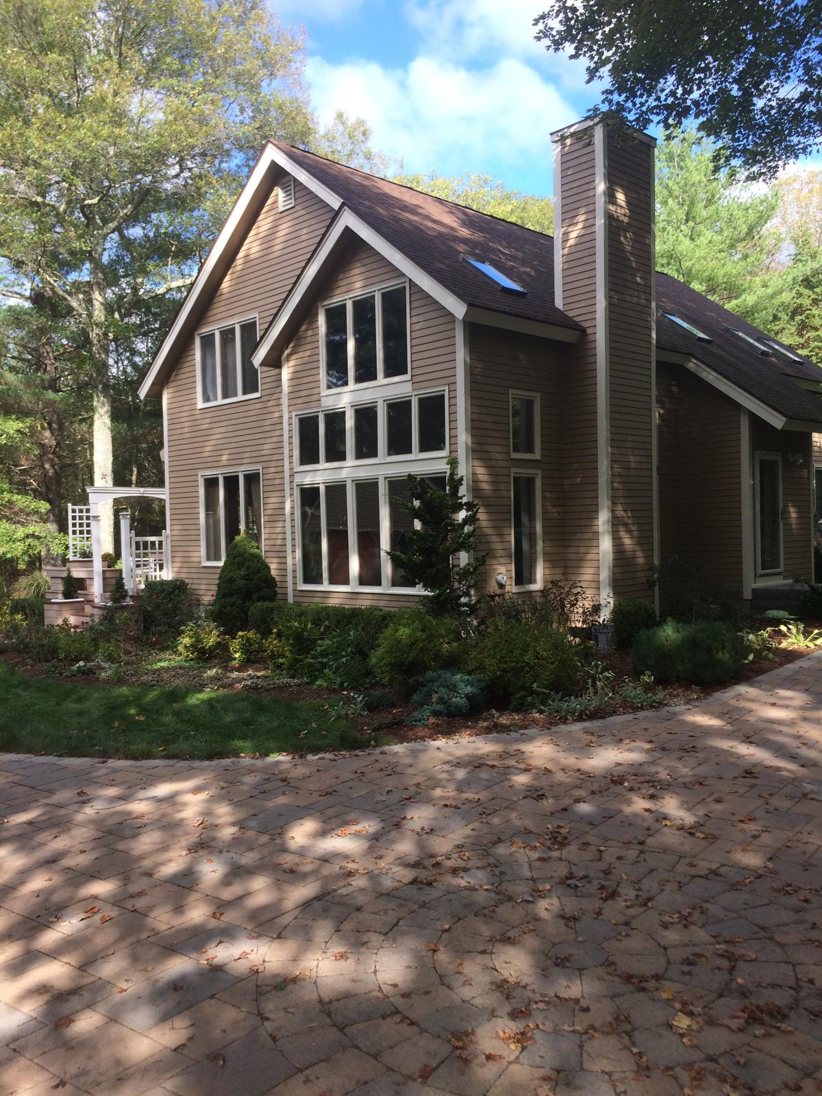 Finished exterior repaint of a Massachusetts home by Creative Painting