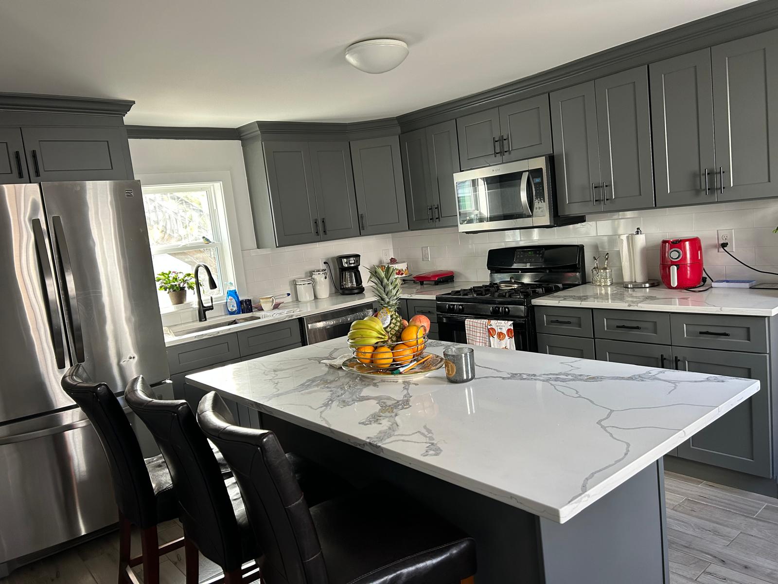 Modern gray cabinets repainted by Creative Painting
