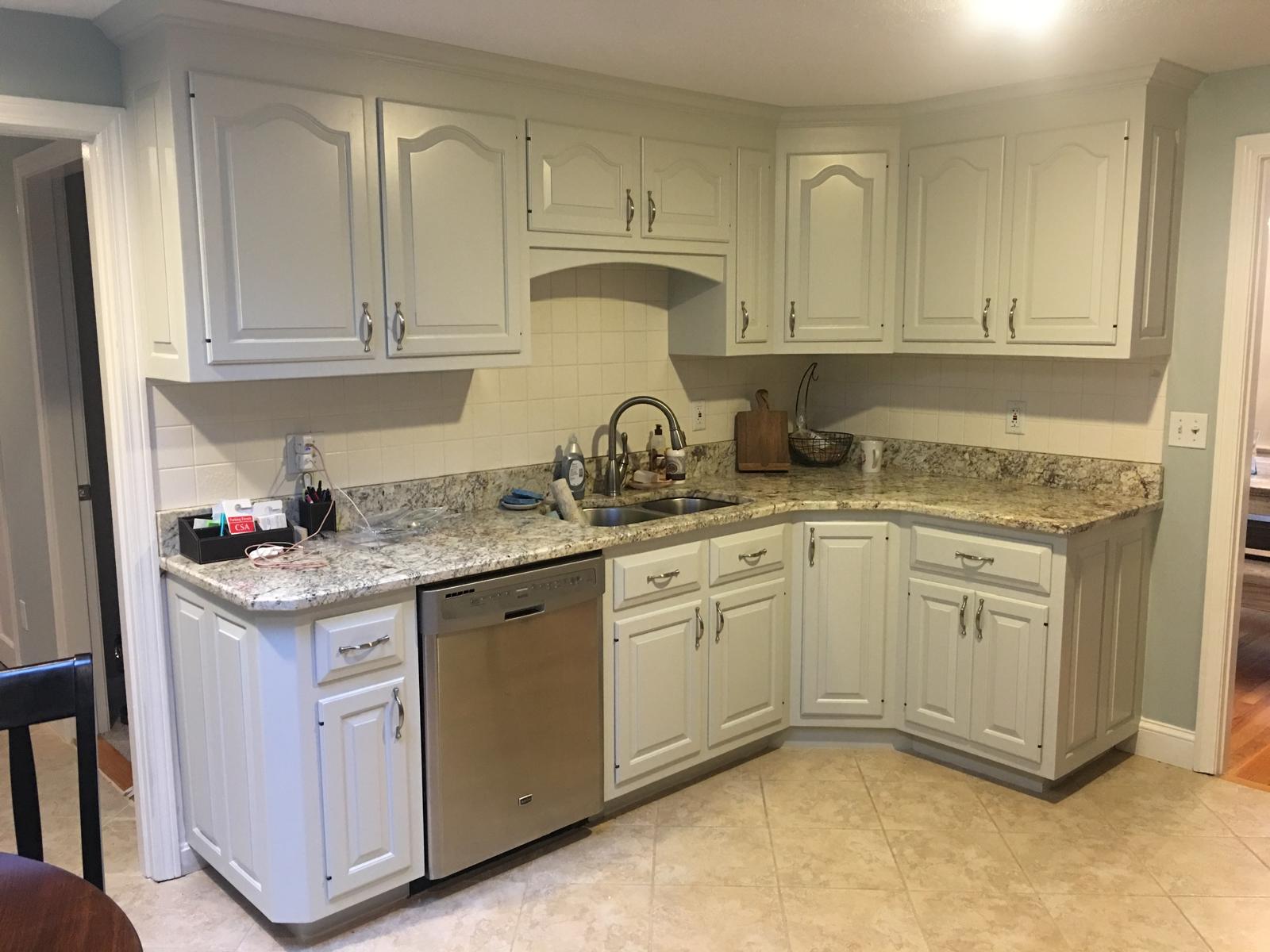 Traditional white cabinets repainted by Creative Painting